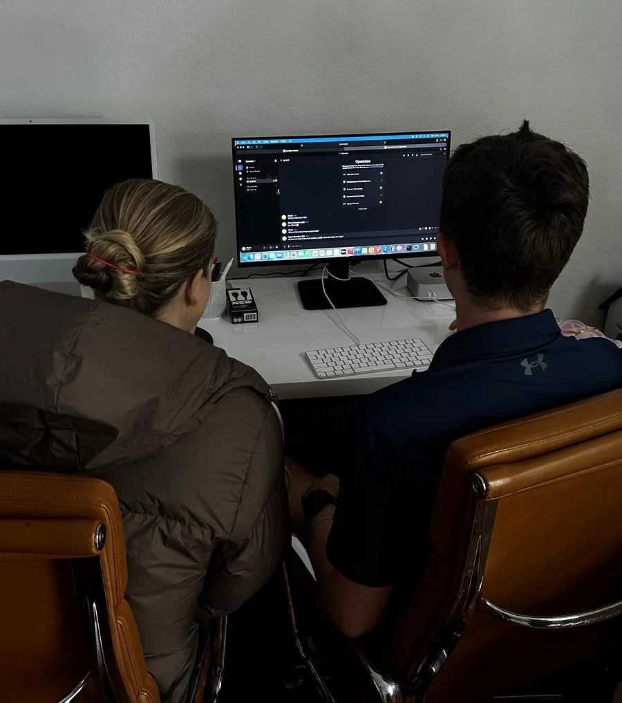 The Intraflow team setting up a client's AI agents